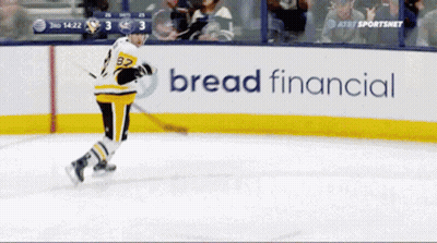 Hockey Player Skating In Front Of Bread Financial Sign GIF