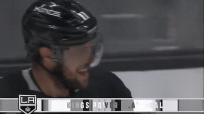 Hockey Player Smiling In Helmet And Goggles By LA Banner GIF