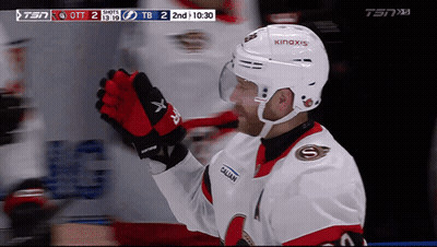 Hockey Player Smiling With A On Jersey GIF