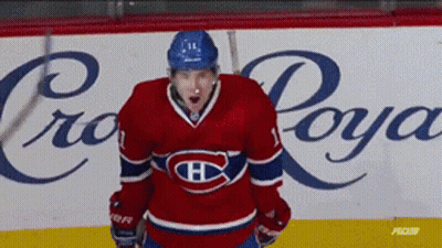 Hockey Player Standing Before Crown Royal Sign GIF
