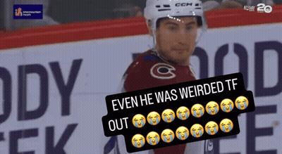 Hockey Player Standing In Front Of Eddy Banner GIF