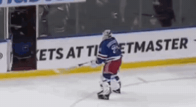 Hockey Player Standing In Front Of Ets At Ticketmaster Sign GIF