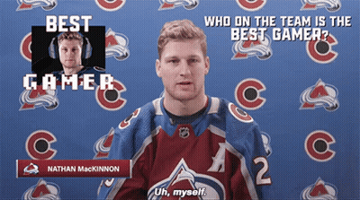 Hockey Player Standing Next To Bauer Stick GIF