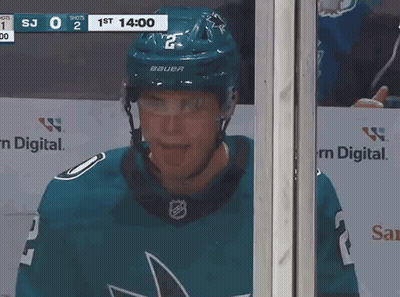 Hockey Player Sticking Tongue Out In Bauer Helmet GIF