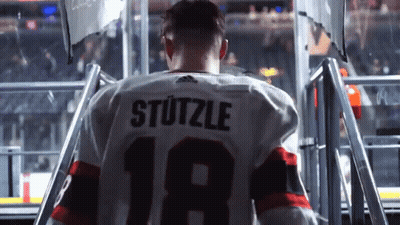 Hockey Player Stutzle Wearing Number 18 Jersey GIF