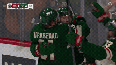 Hockey Player Tarasenko Hugging Teammate GIF
