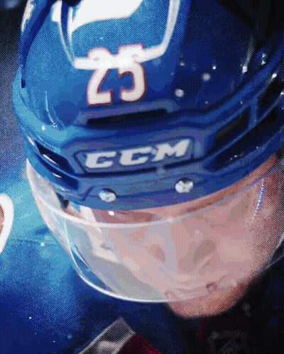 Hockey Player Wearing Blue Helmet Number 25 GIF