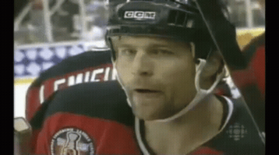 Hockey Player Wearing Helmet Close Up GIF