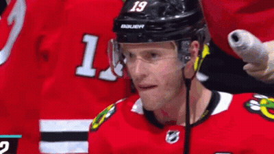 Hockey Player Wearing Helmet Number 19 GIF