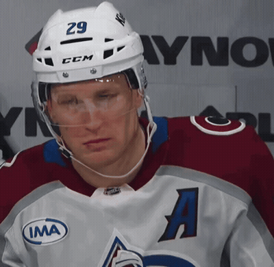 Hockey Player Wearing Helmet Number 29 GIF