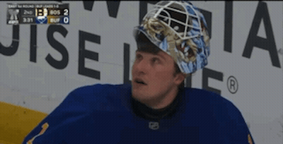 Hockey Player Wearing Helmet With Scoreboard GIF