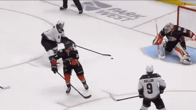 Hockey Player Wearing Number 9 Jersey GIF