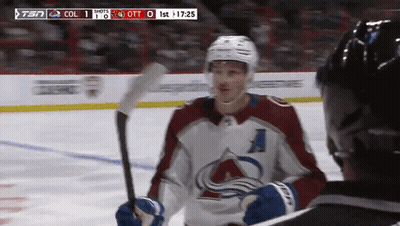 Hockey Player With A Talking To Referee GIF