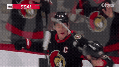 Hockey Player With C Jersey Celebrates Goal GIF