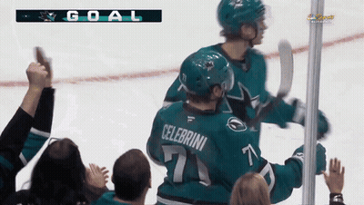 Hockey Player With Celebrini On Back GIF