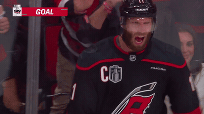 Hockey Player With Goal Helmet GIF