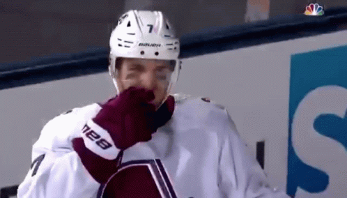 Hockey Player With Helmet And Gloves Number 7 GIF