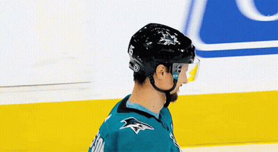 Hockey Player With Helmet And Sharks Jersey GIF