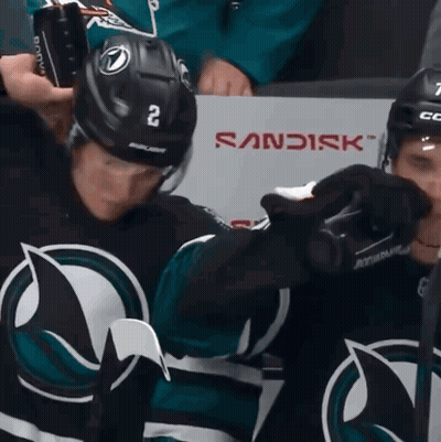Hockey Player With Helmet Saying 2 GIF