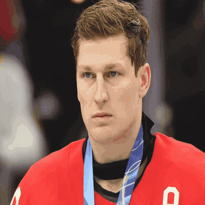 Hockey Player With Medal And Letter O On Jersey GIF