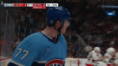 Hockey Player With Number 77 GIF