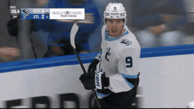 Hockey Player With Number 9 Jersey GIF