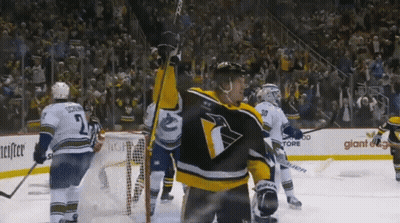 Hockey Player With Penguin Jersey On Ice GIF
