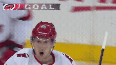 Hockey Player With Red Helmet Number 68 GIF
