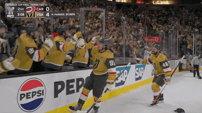 Hockey Players Celebrate Goal In Front Of Pepsi Ad GIF
