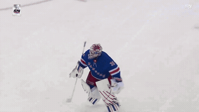 Hockey Players Celebrate Goal In Front Of Sn Sign GIF