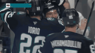 Hockey Players Celebrate Goal With SN Logo GIF