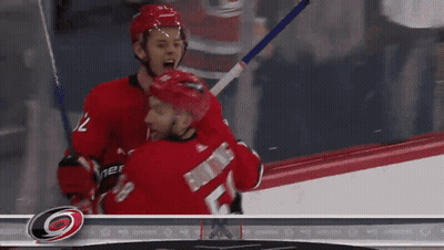 Hockey Players Hugging Number 7 GIF
