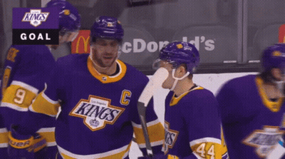 Hockey Players In Purple And Yellow Kings Jerseys GIF