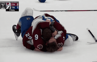 Hockey Players Lying On Ice After Final GIF