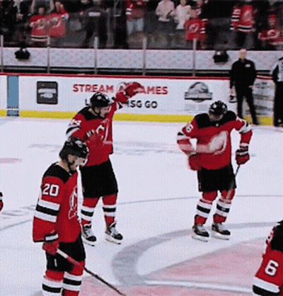 Hockey Players On Ice With Stream Games Banner GIF