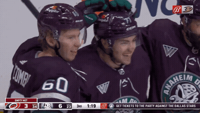Hockey Players Posing With Ducks Logo GIF