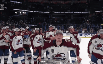Hockey Players Posing With Trophy GIF