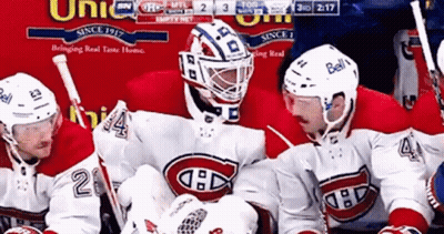 Hockey Players Standing Together GIF