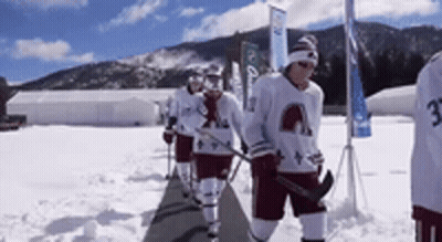Hockey Players Walking In Snow Number 3 GIF