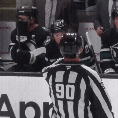 Hockey Referee With Number 90 On Jersey GIF