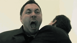 Holding Back Super Angry Man GIF