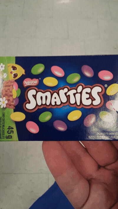 Holding Box Of Smarties GIF