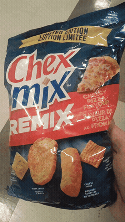 Holding Chex Mix Remix Pizza Crackers GIF