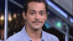 Holding In Laugh Eduardo Sterblitch With Mustache GIF