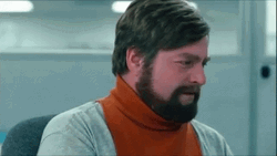 Holding In Laugh Zach Galifianakis GIF