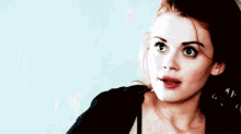 Holland Roden Eyes Rolled Taking Off Clothes  GIF