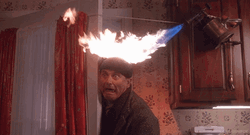 Home Alone Harry Lime's Hair Getting Burned GIF