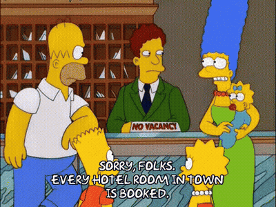 Homer And Marge Simpson In Front Of No Vacancy Sign GIF