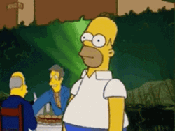 Homer Disappearing On The Green Grass GIF