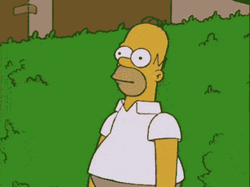 Homer Hiding In The Green Grass GIF